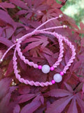 bracelet mère fille tissé à la main en micro macramé de couleur bois de rose avec une perle en quartz rose de 8mm